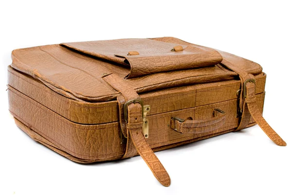 白色底座上的旧行李箱 — 图库照片