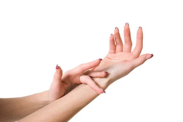 Main de femme avec manucure sur fond blanc — Photo