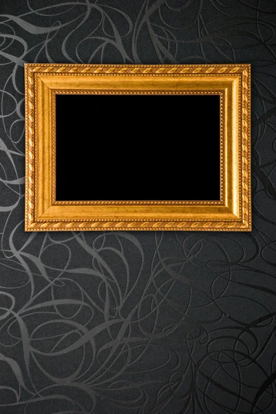 Золотая рамка на черном винтажном фоне обоев — стоковое фото