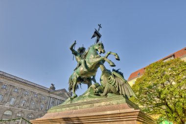 Saint George Fighting the Dragon Statue at Berlin, Germany clipart