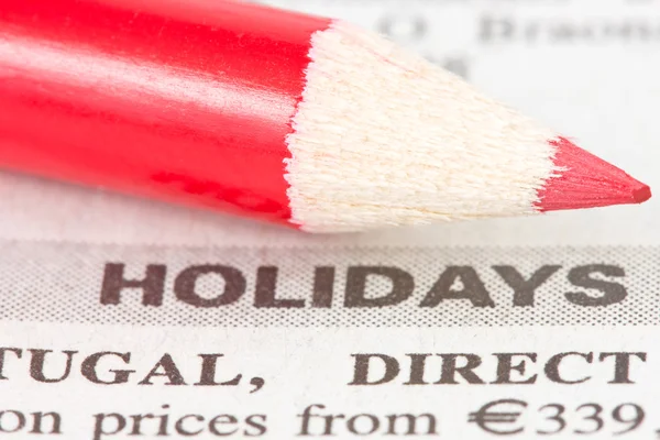 Newspaper with holidays ad — Stock Photo, Image