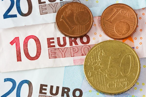 Banconote e monete in euro — Foto Stock