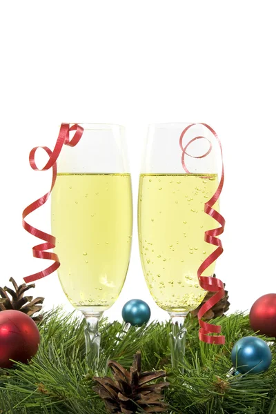 Kerstdecoratie met twee glazen van champagne Stockafbeelding