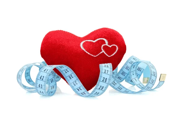 Red heart with measure tape — Stock Photo, Image