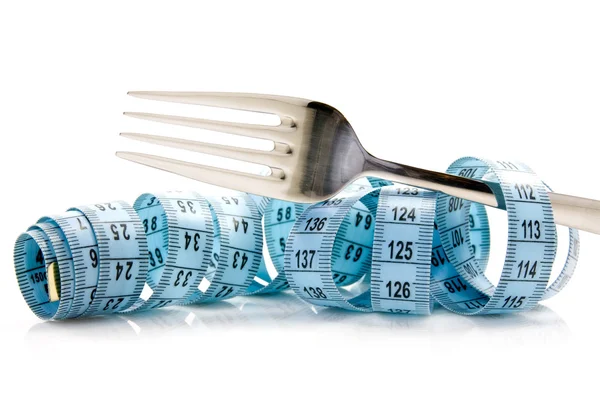 Measure tape and fork — Stock Photo, Image