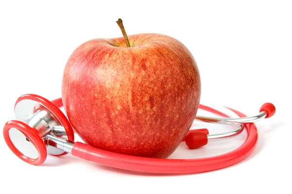 Kırmızı elma ve stetoskop — Stok fotoğraf
