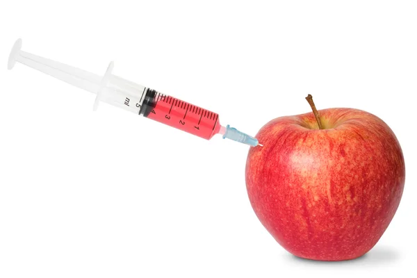 Red apple and syringe — Stock Photo, Image