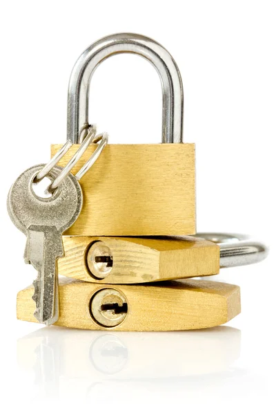 Three golden padlocks — Stock Photo, Image