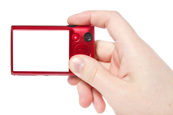 Mão com câmara fotográfica digital vermelho — Fotografia de Stock