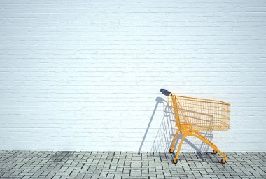 süpermarkette alışveriş trolley duvarın
