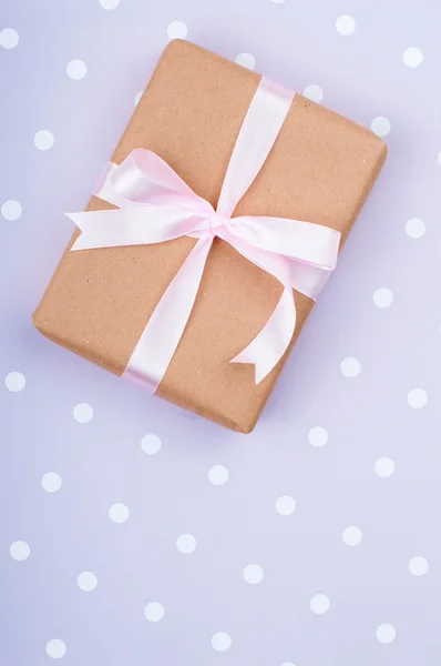 Gift tied with a ribbon — Stock Photo, Image