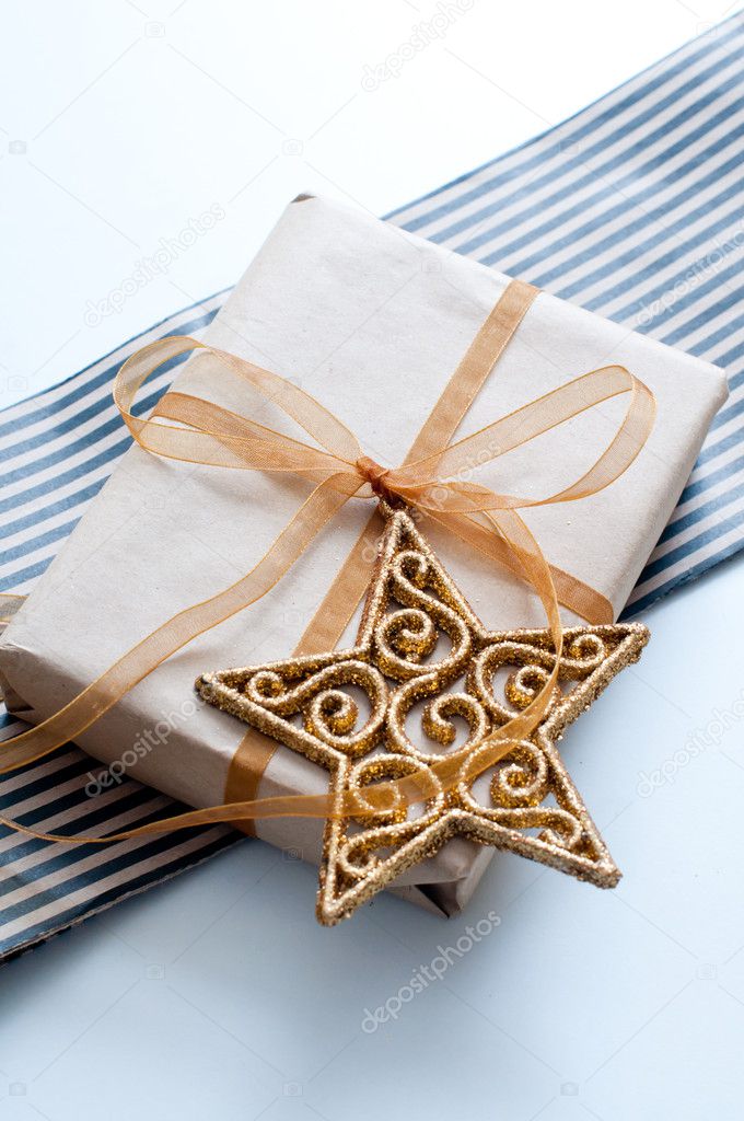 Christmas gift with a golden star