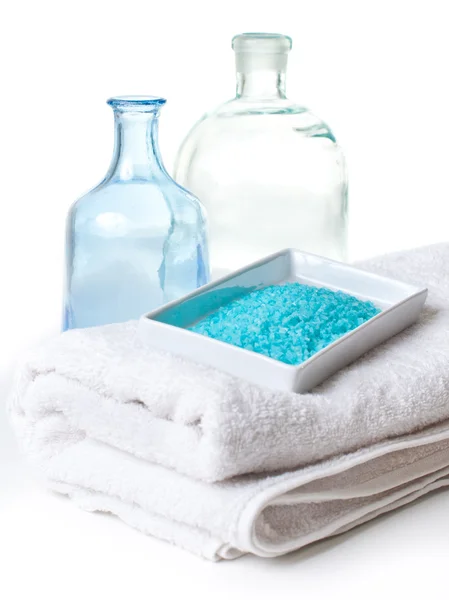 Salt, white towels and a bottles — Stock Photo, Image