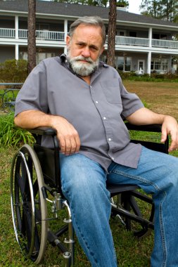 Cripple In Wheelchair clipart
