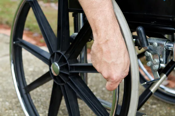 Hand On Wheelchair — Stock Photo, Image
