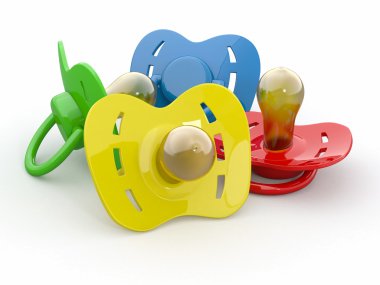 Baby's pacifiers on white isolated background. clipart