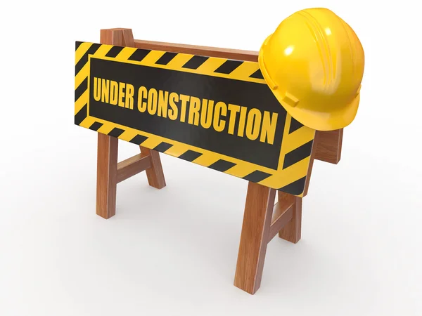 Barrier with text under construction and hardhat — Stock Photo, Image