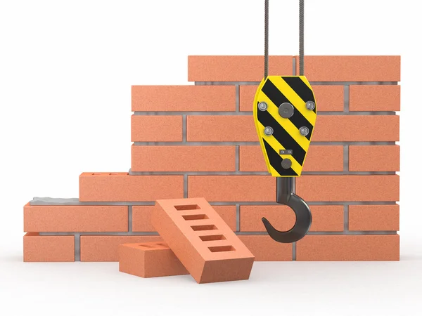 Under construction. Brick wall, crane and hardhat — Stock Photo, Image