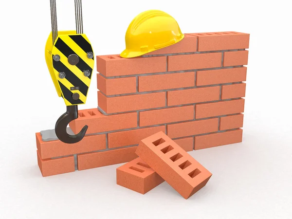 Em construção. Parede de tijolo, guindaste e hardhat — Fotografia de Stock