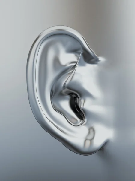 Серебряное металлическое человеческое ухо. 3d — стоковое фото