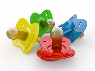 Baby's pacifiers on white isolated background. clipart