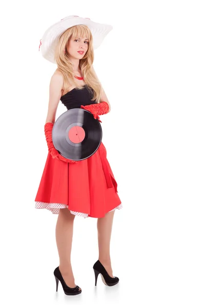 Retro stijlvolle jonge vrouw met pramophone record — Stockfoto