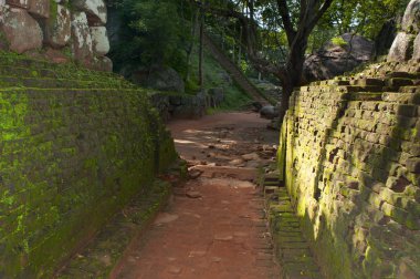 Ancient path and walls in rock fortress and palace clipart