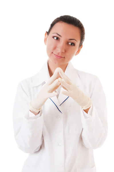 Enfermera reflexiva en guantes Imagen de archivo
