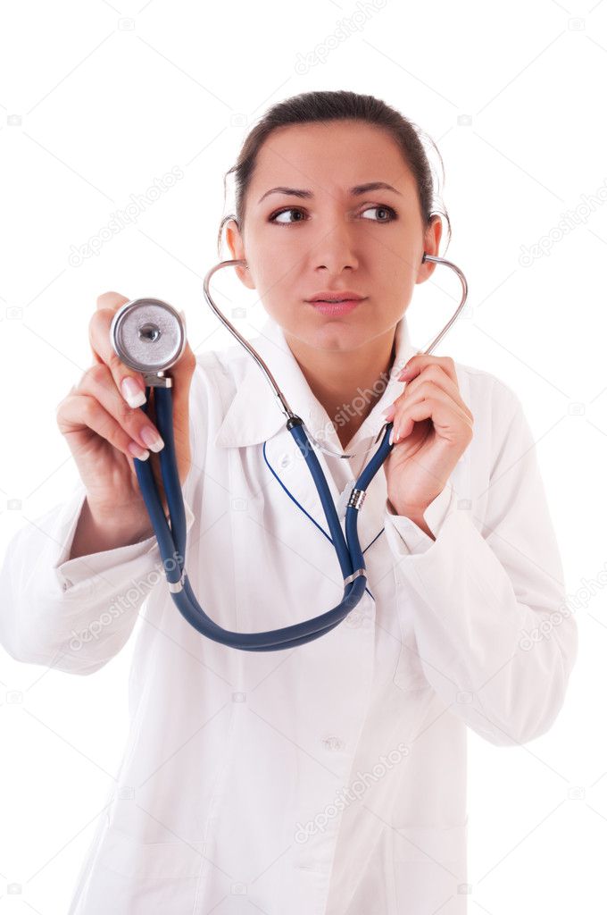 Serious doctor listen with stetoscope