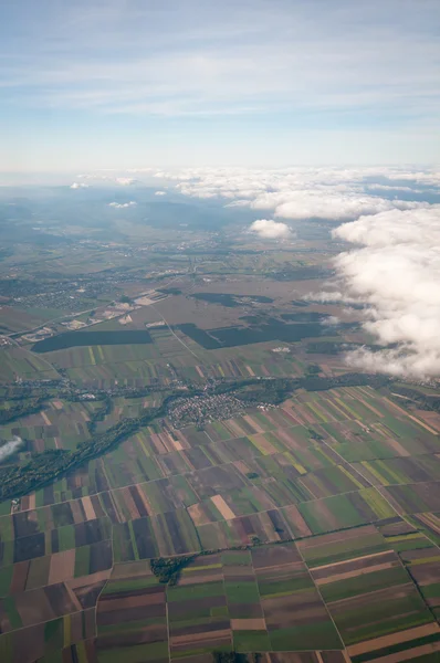 stock image Beautiful view above cloudscape and fields