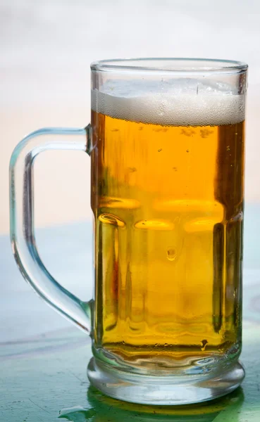 stock image Big beaker with fresh beer