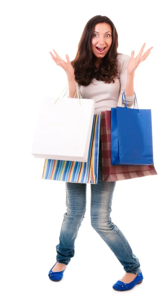 Mulher emocional com sacos de compras — Fotografia de Stock