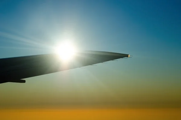 Sun on the airplane wing — Stock Photo, Image