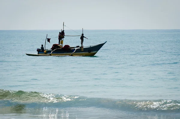 Fishing on small motorboat — Stock Photo, Image