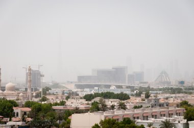 Dubai covered by sand haze clipart