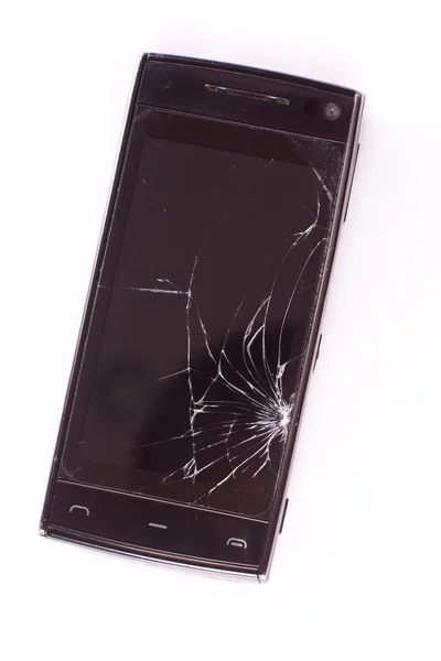 Stock image Damaged smart phone on white background