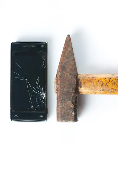 stock image Hammer smashing smart phone