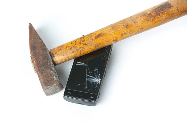 Stock image Hammer smashing smart phone