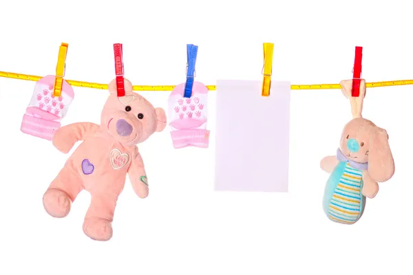 Clothesline üzerinde asılı bebek ürünleri — Stok fotoğraf