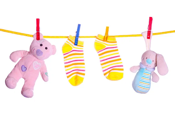 stock image Baby goods hanging on the clothesline
