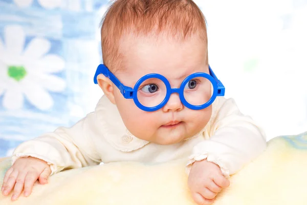 Portrait of funny baby with glasses — Stock Photo, Image