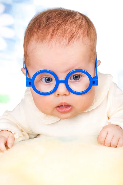 Portrait of funny baby with glasses — Stock Photo, Image