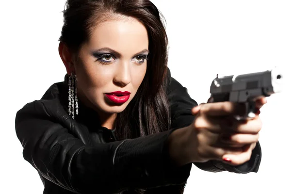 Elegant fashionable woman with a pistol in hands — Stock Photo, Image