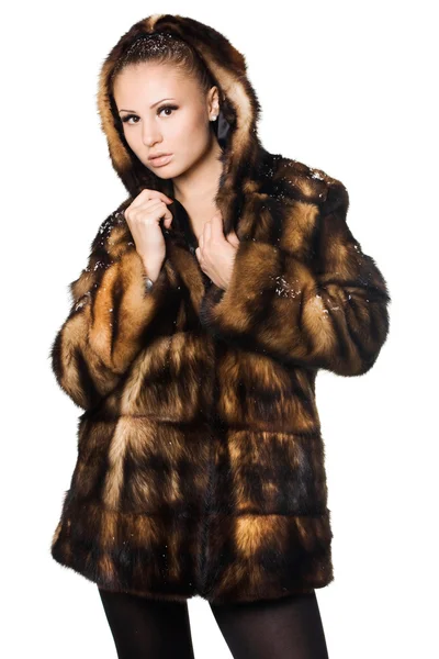 Hermosa mujer en un abrigo de piel —  Fotos de Stock