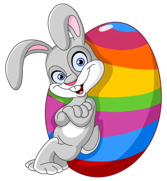 Bunny with easter egg — Stock Vector