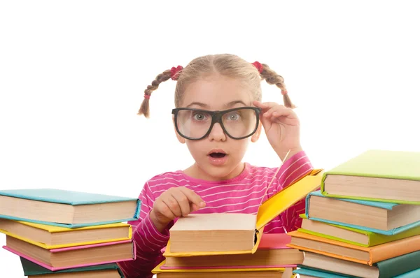 Klein meisje met boeken — Stockfoto