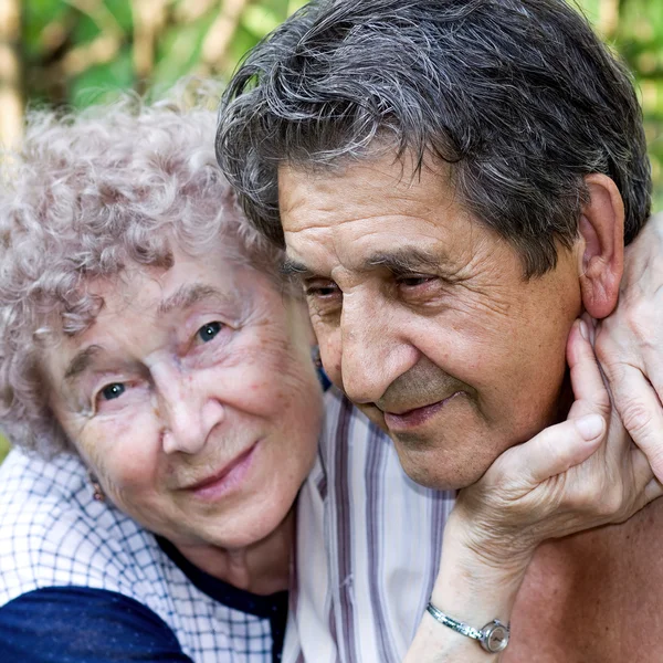 Actual gladness of elderly hugging — Stock Photo, Image