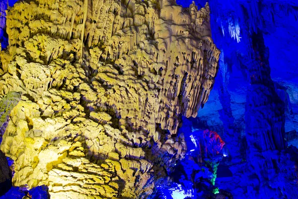 The illuminated Reed Flute Caves — Stock Photo, Image