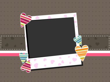 Template photo frame with colorful hearts on brown background. clipart