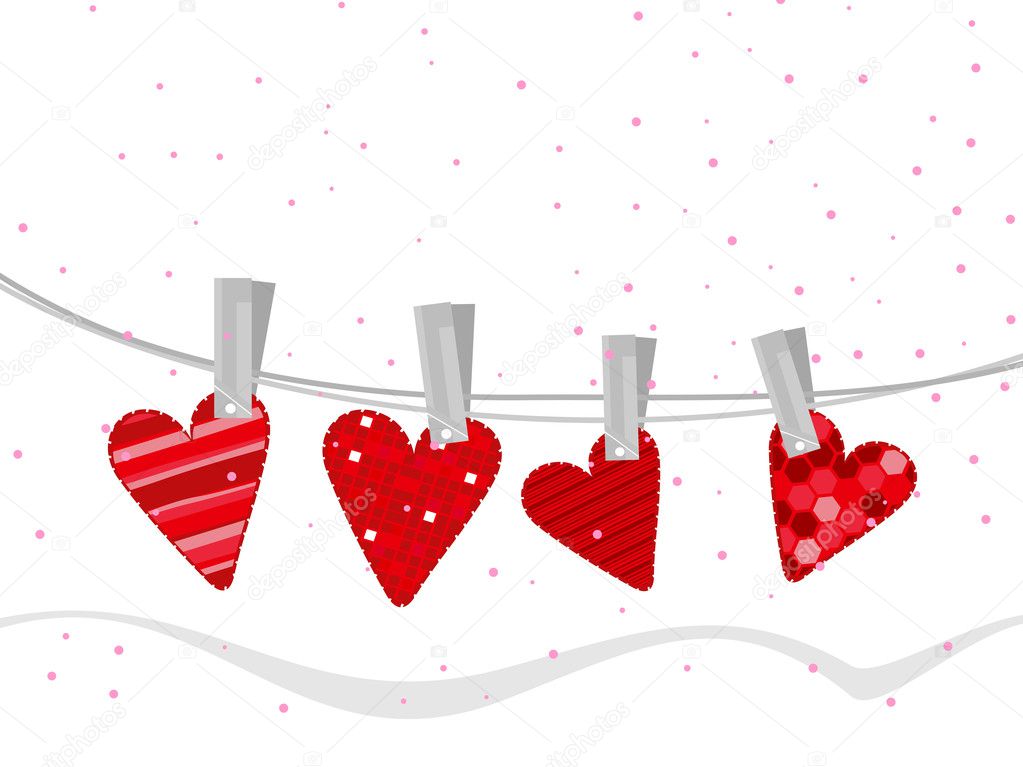 Handmade clothes in heart shapes hanging on line for Valentine D